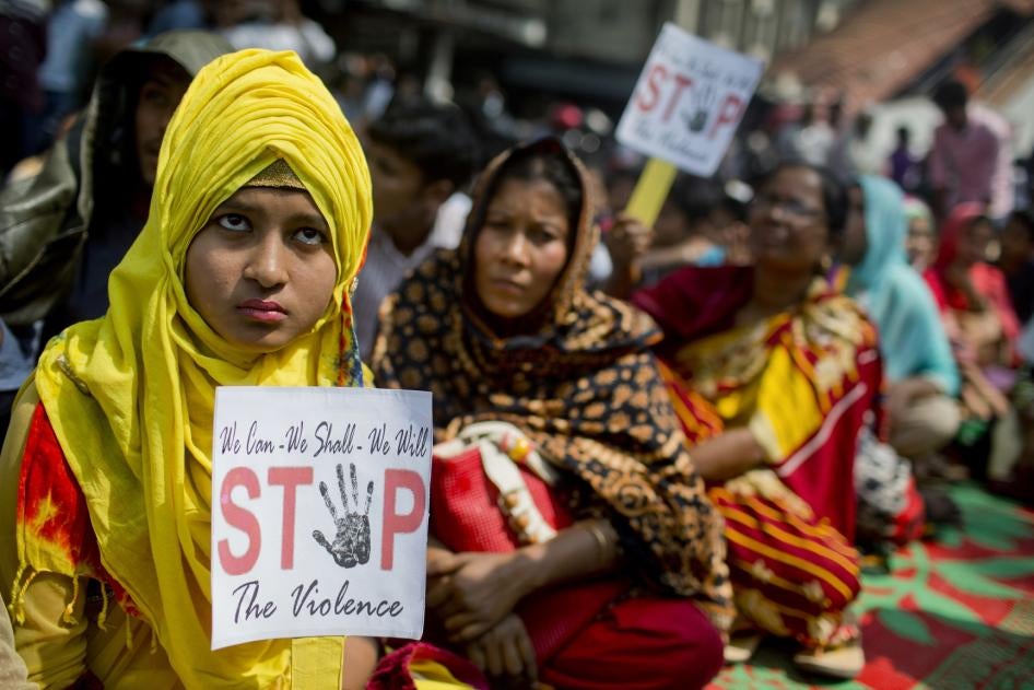 Bangladeshi women hold placards during a rally to mark the International Women's Day in Dhaka, Bangladesh.