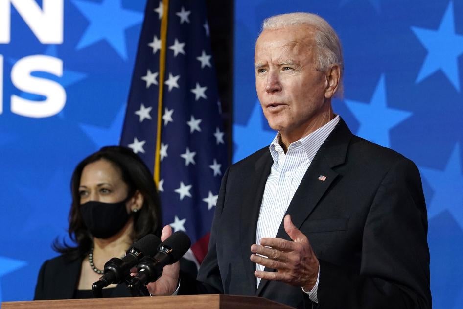 Joe Biden speaks in Wilmington, Delaware on November 5, 2020, while Kamala Harris looks on.  