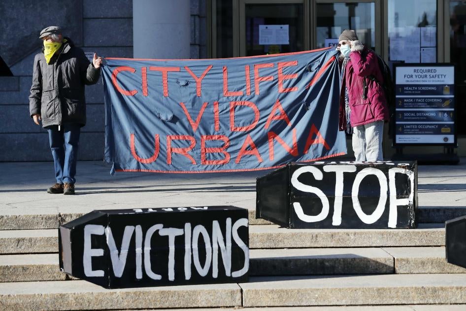 Tenants’ rights advocates demonstrate in front of the Edward W. Brook Courthouse in Boston