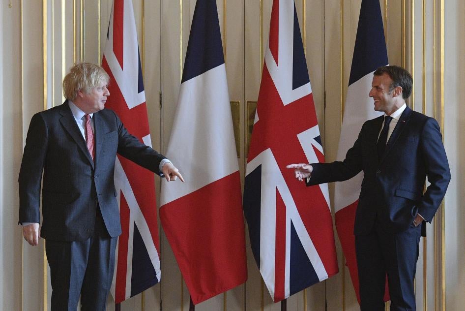 French President Emmanuel Macron, right, and Britain's Prime Minister Boris Johnson, during a visit to 10 Downing Street in London on June 18, 2020. 