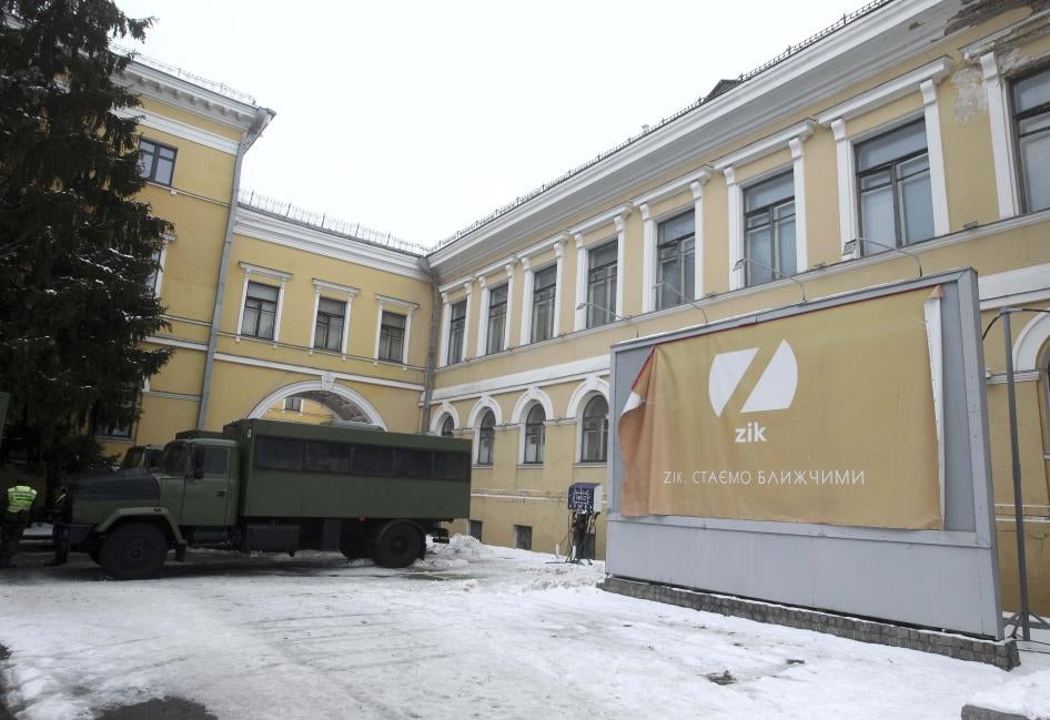 An advertising banner for ZIK TV channel stands in front of the building in which the channel is located, in central Kyiv, Ukraine on 03 February 2021.