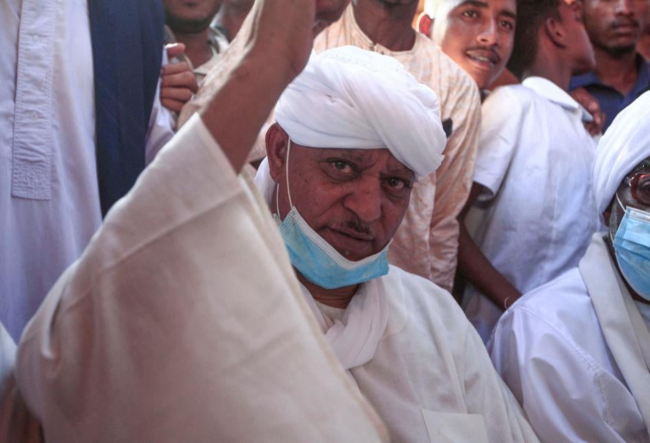 Sudanese Janjaweed militia chief Musa Hilal waves following his release in the Maamoura suburb of the capital Khartoum, Sudan, March 11, 2021. 