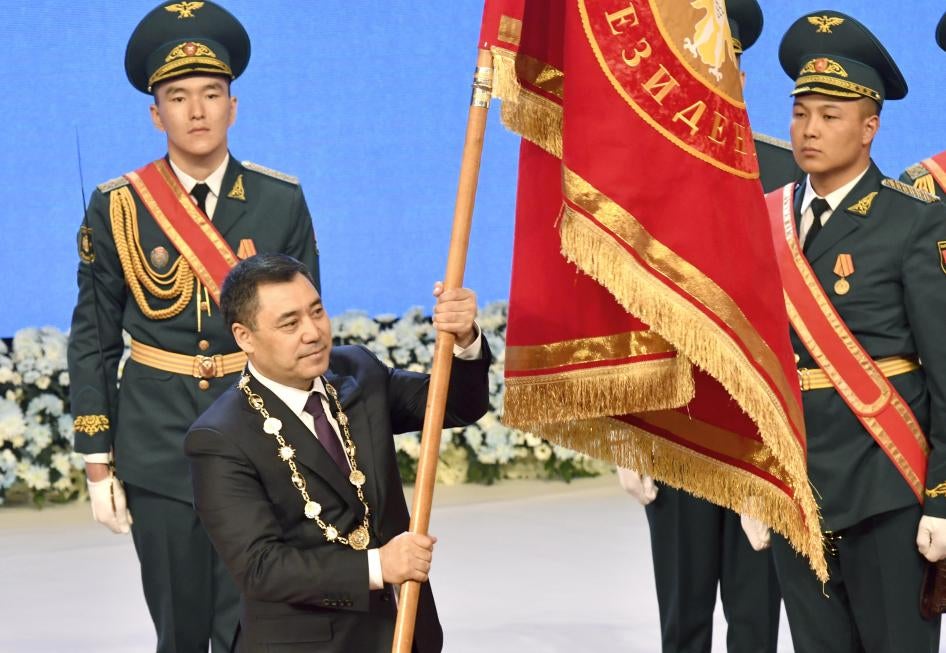 Kyrgyzstan President Sadyr Zhaparov holds presidential standard during his inauguration ceremony in Bishkek, Kyrgyzstan.