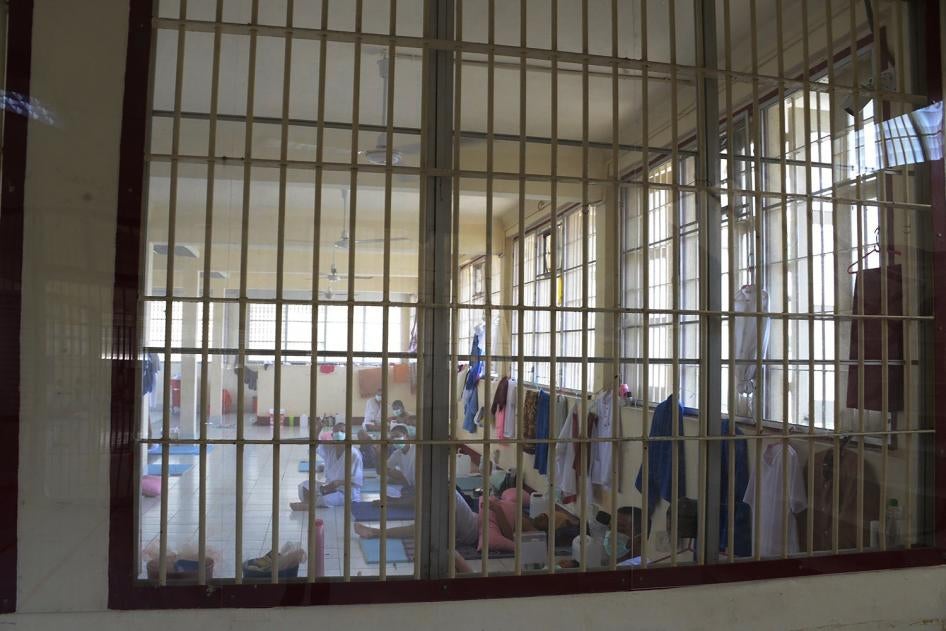 In this photo released by the Department of Corrections, COVID-19 prisoners sit inside a field hospital set up at the Medical Correctional Institution to treat COVID-19 inmates in Bangkok, Thailand on May 8, 2021.