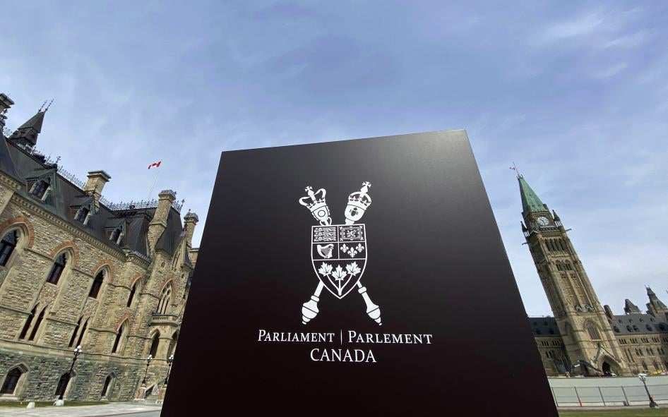 The Canadian Parliament buildings are seen in Ottawa, April 27, 2020. © 2020 Adrian Wyld/The Canadian Press via AP