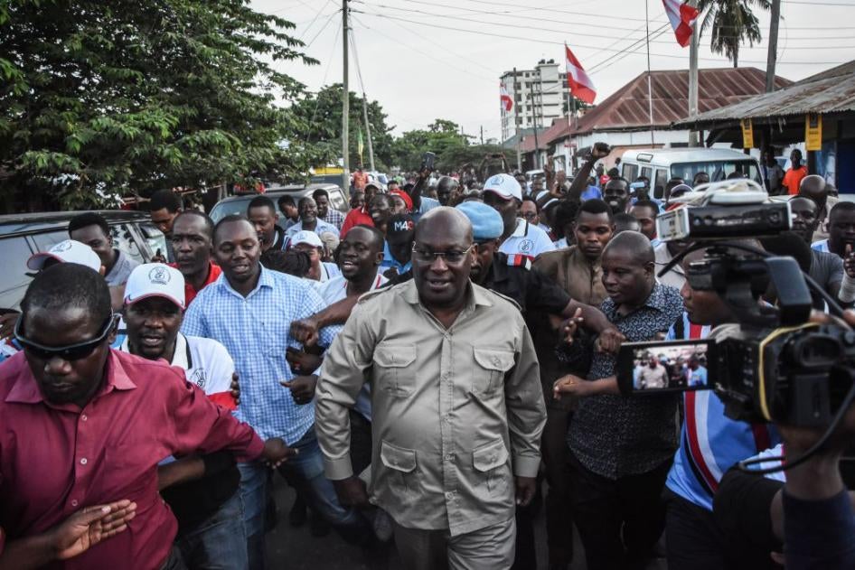 Tanzania Chadema party chairman Freeman Mbowe (center) arrives at the party's headquarters after being released from Segerea prison in Dar es Salaam, Tanzania, on March 13, 2020.