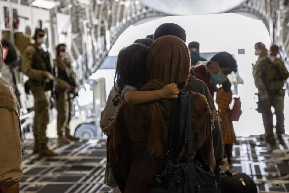 Afghanistan evacuees arrive at Australia’s main operating base in the Middle East