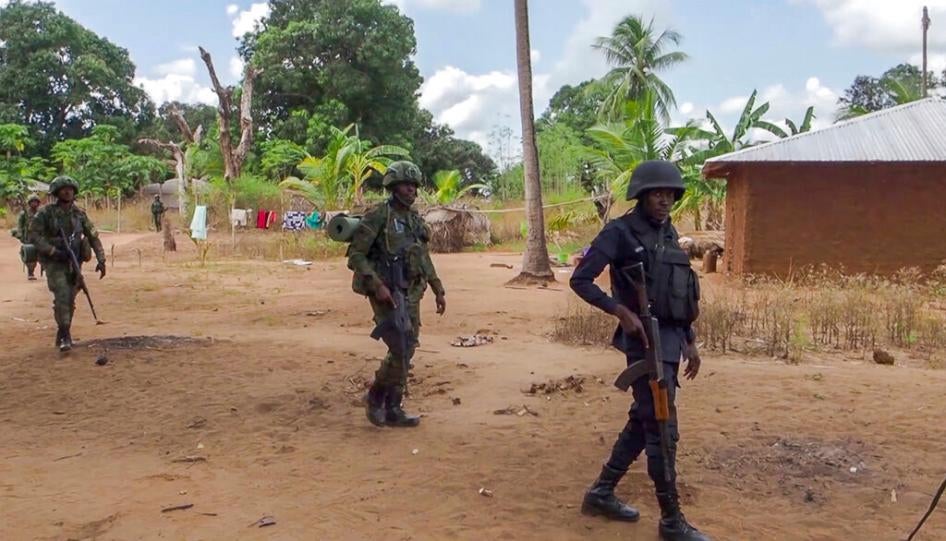 Rwandan soldiers patrol the village of Mute, in Cabo Delgado province, Mozambique, on August 9, 2021.