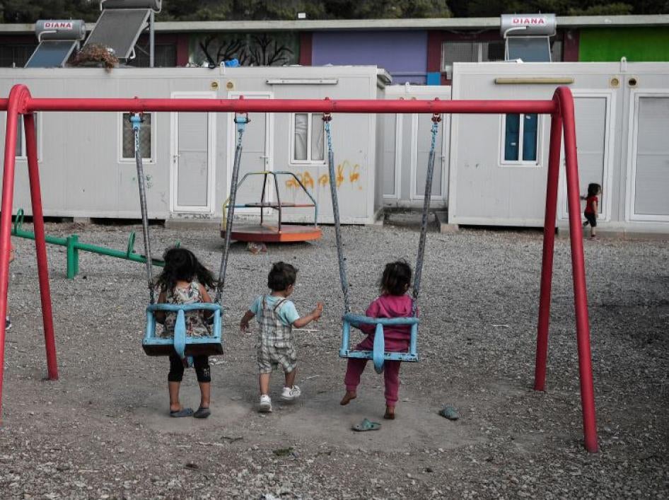 Children play in a playground in the Ritsona refugee camp, north of Athens, Greece on October 22, 2019.