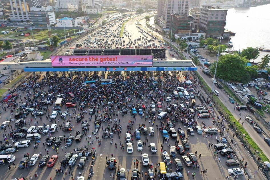 An aerial view shows #EndSARS protesters at the Lekki toll gate in Lagos, on October 15, 2020. 