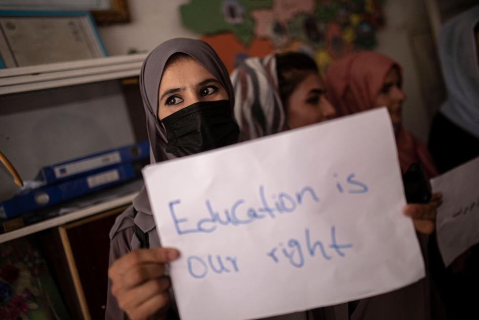 Women demonstrate for their rights during a gathering for National Teachers Day in Kabul, Afghanistan, October 5, 2021.