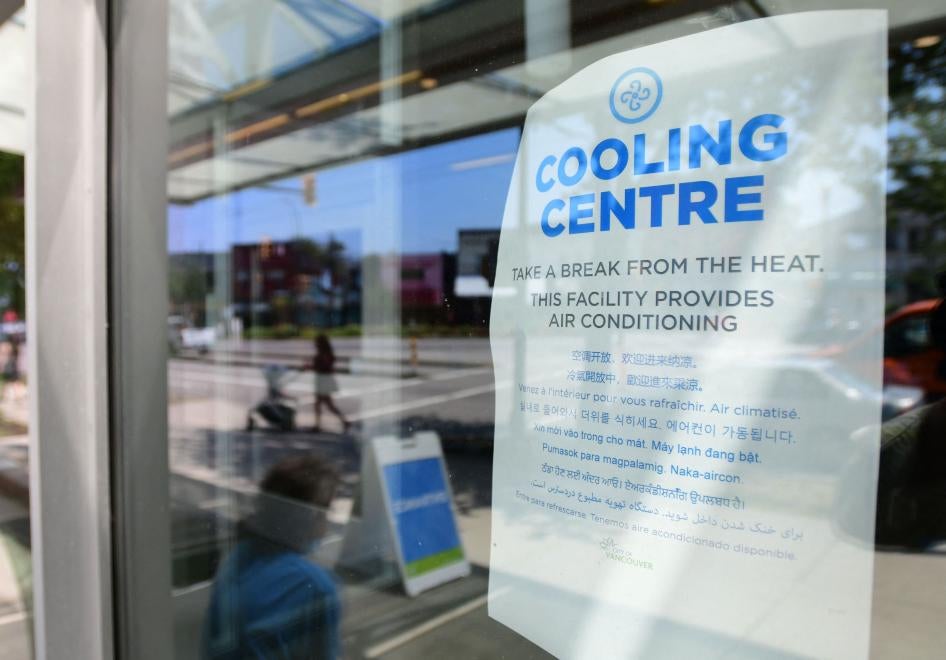 A welcoming sign is seen on the door of the Hillcrest Community Centre where people can cool off during the extreme hot weather in Vancouver, British Columbia, Canada