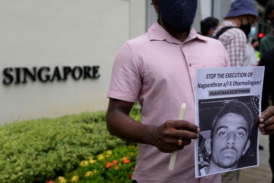 Activists attend a candlelight vigil against the impending execution of Nagaenthran K. Dharmalingam outside the Singaporean embassy in Kuala Lumpur, Malaysia