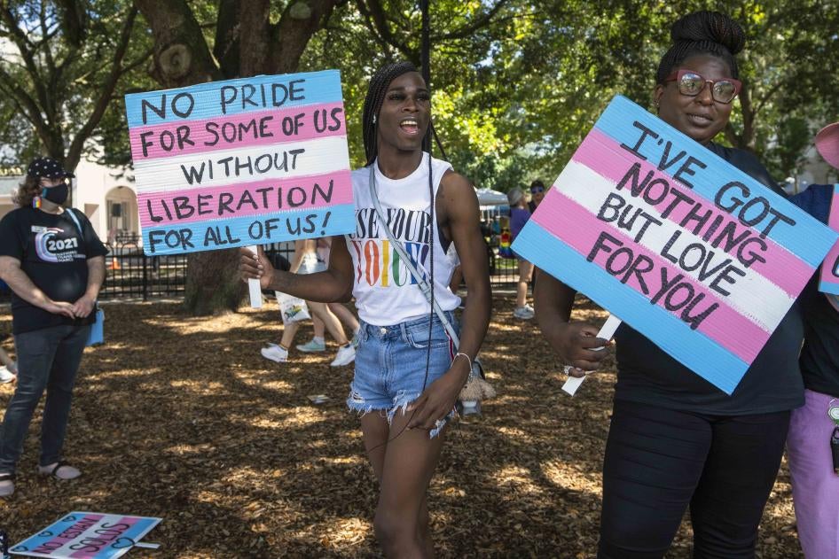 Participants in the National Trans Visibility March in downtown Orlando, Florida on October 9, 2021. © 2021 Sipa USA via AP