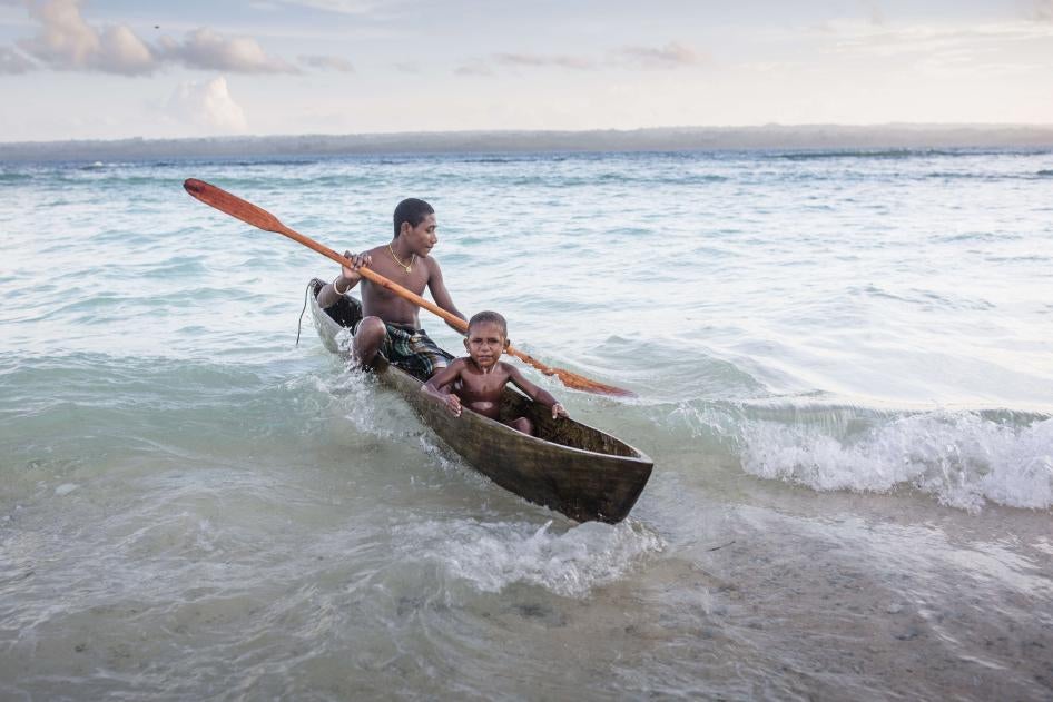Two boys in a canoe