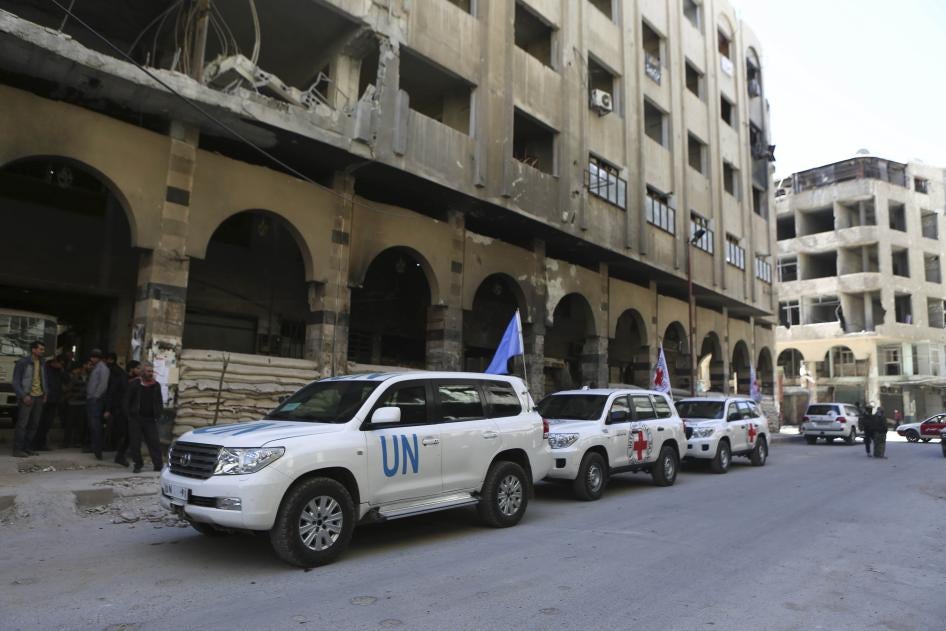 Vehicles of an aid convoy after arriving at the opposition-held city of Douma, Eastern Ghouta province, Syria, March 9, 2018.