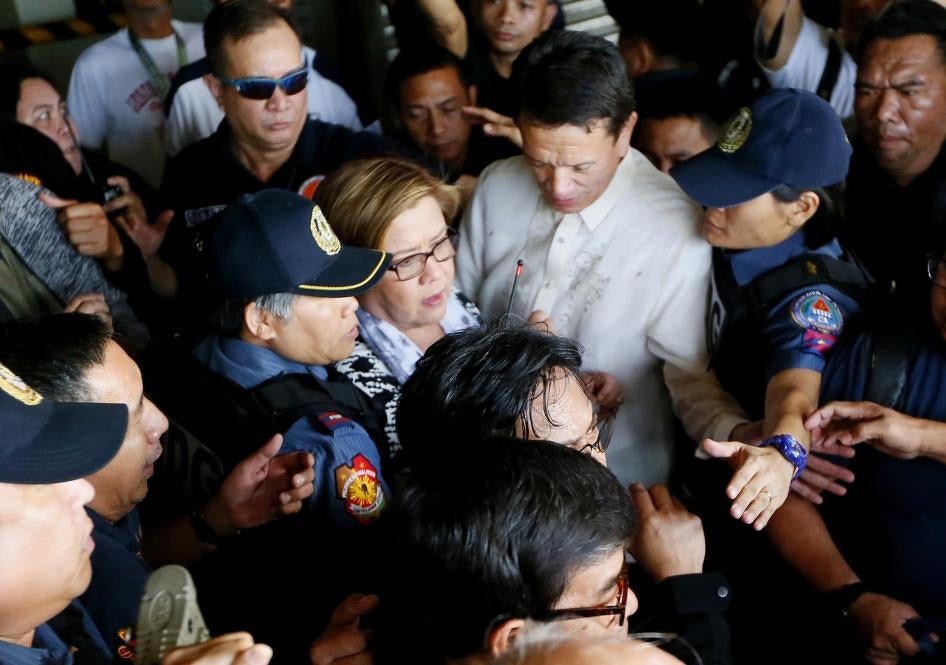 Senator Leila de Lima, center, is escorted to detention a day after a warrant was issued for her arrest, Manila, Philippines, February 24, 2017. 