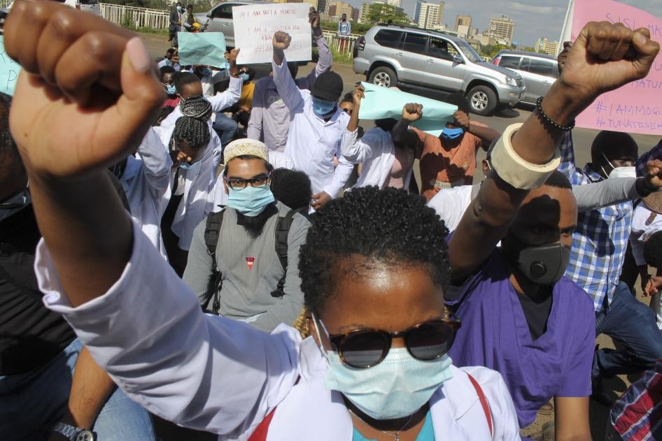 Medical workers protest to honor medical staff who have died from Covid-19, and to demand better protection and working conditions from the government, outside the Ministry of Health in Nairobi, Kenya, December 9, 2020. 