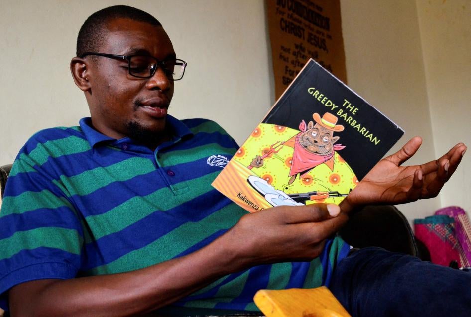 The Ugandan author of "Greedy Barbarian," Kakwenza Rukirabashaija, at his home in Iganga district in Eastern Uganda, May 11, 2020.