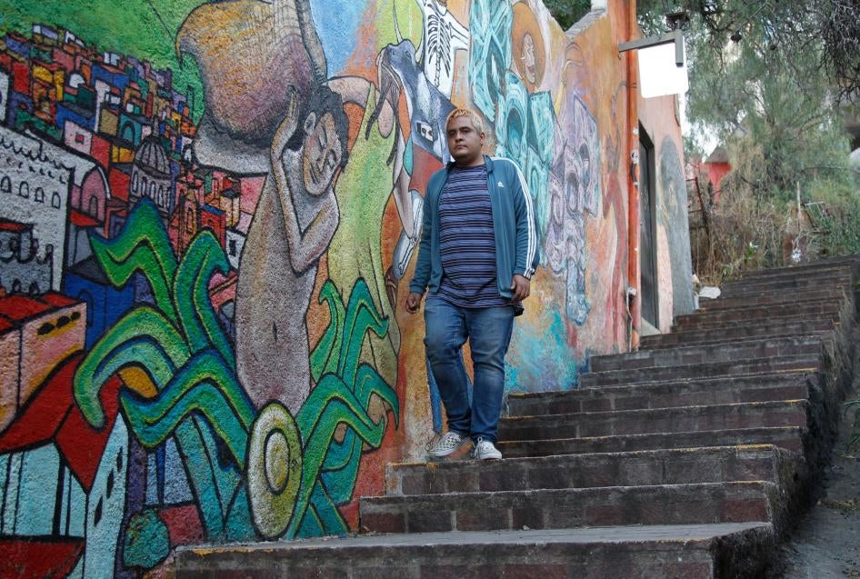 Fausto Martínez descends a flight of stairs in Guanajuato, Mexico, February 18, 2022.