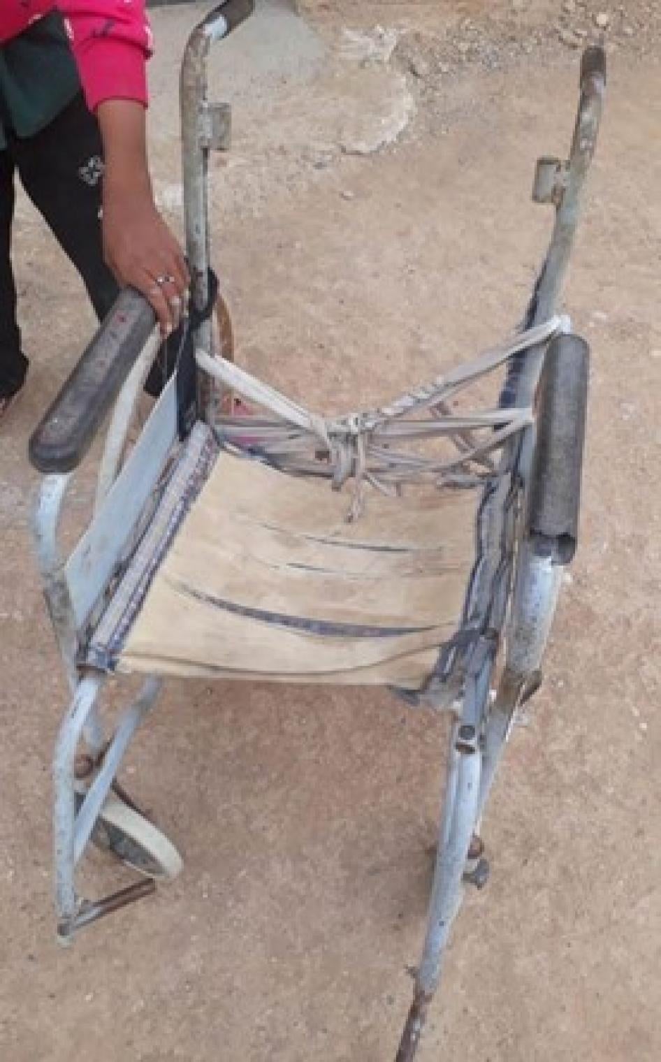 A damaged and dysfunctional wheelchair used by a 12-year-old girl in northeast Syria. 