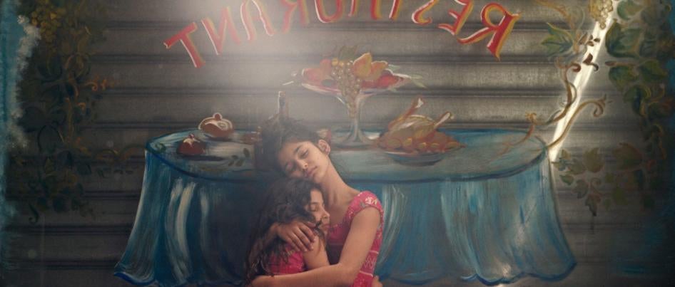 You Resemble Me screengrab of two girls embracing