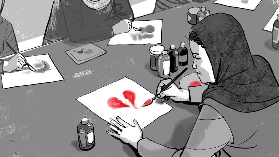 Black-and-white illustration of three Afghan women attending an art therapy session, showing the face of one woman only. Each woman is drawing on a page with a brush, there are eight ink tubes on the table; a young woman paints a red, broken heart