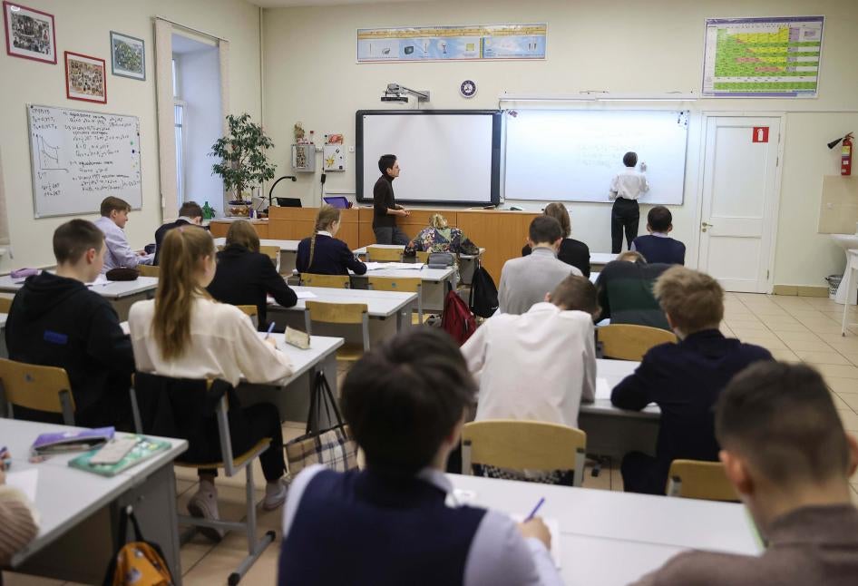 Students at desks in a classroom