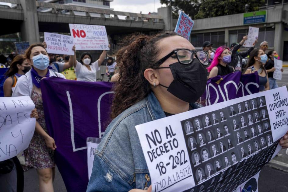 People protest a bill that would have increased sentences for women who terminate their pregnancies, prohibited same-sex marriage and banned discussion of sexual diversity in schools, in Guatemala City, Saturday, March 12, 2022