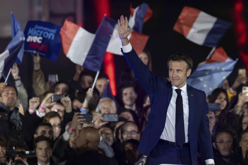French President Emmanuel Macron delivers a speech after his election victory in Paris, April 24, 2022.