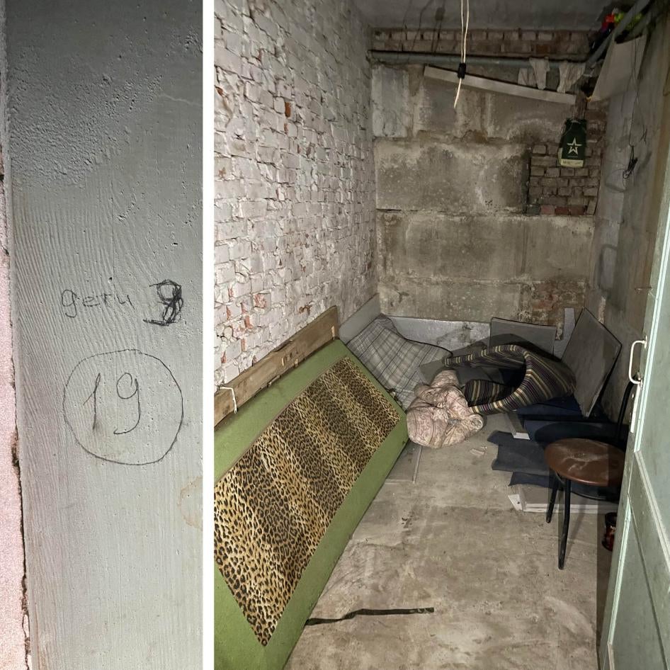 Inscription on a door frame indicates 19 adults and 9 children were held in this room.