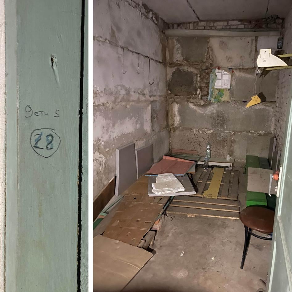 Inscription on a door frame indicates 28 adults and 5 children were held in this room.