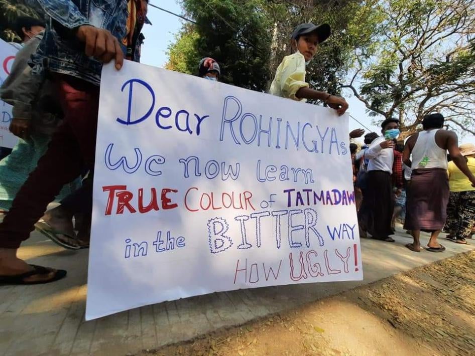 Myanmar protesters hold a message for Rohingya