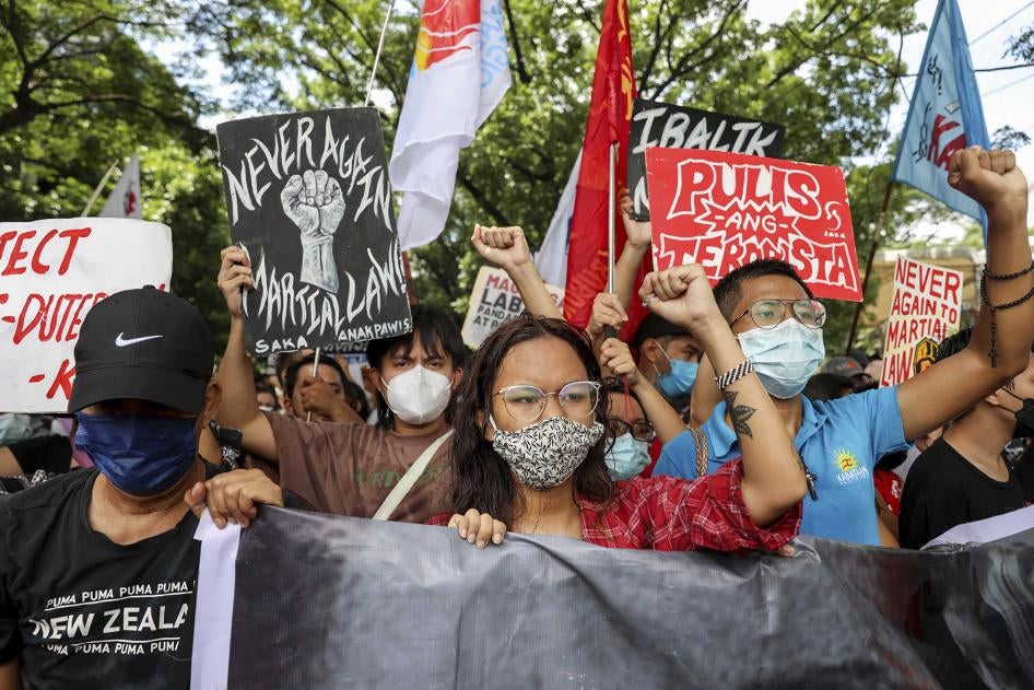 Activists protest against presidential candidate Ferdinand Marcos Jr. during a rally outside the Commission on Human Rights in Quezon City, the Philippines.