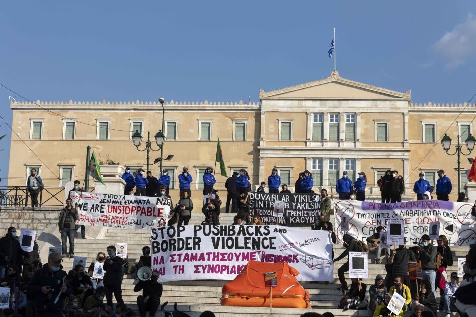 Demonstrators gather in front of the Greek parliament