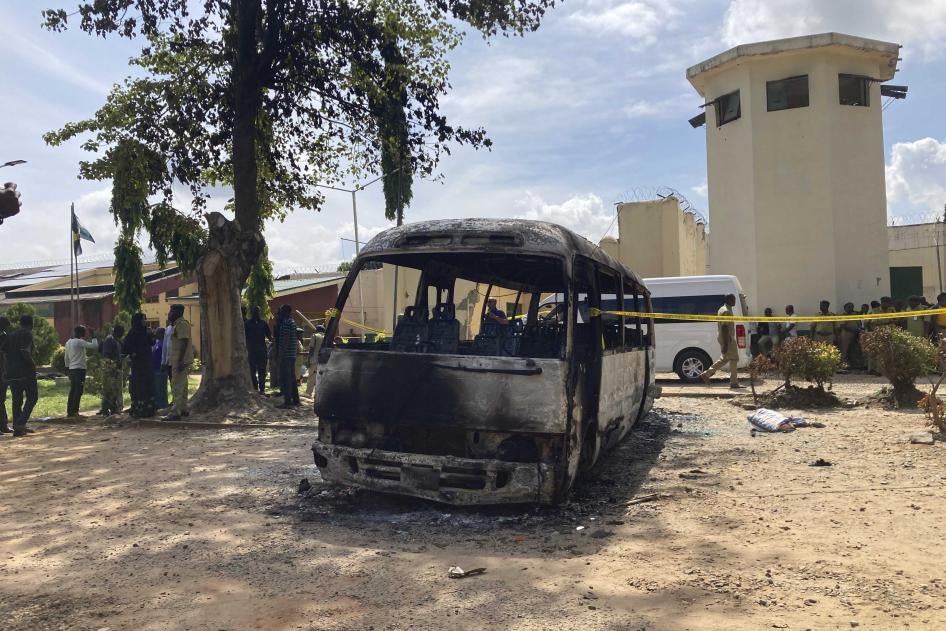 A burned-out bus outside Kuje prison following a jail break, Kuje, Nigeria, July 6, 2022. 