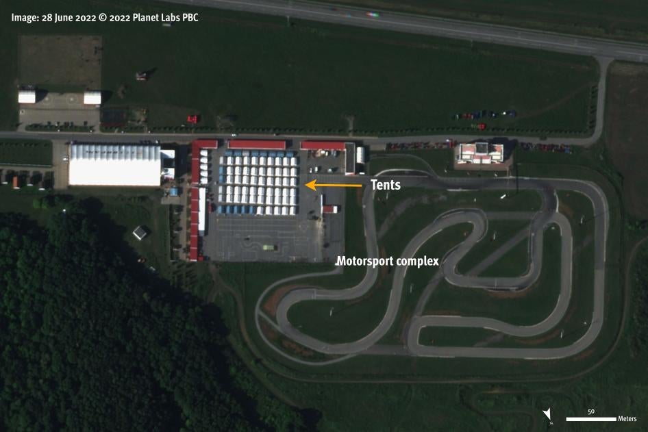Satellite image recorded on June 28 shows at least 68 tents erected in the center of the parking lot of the Virage motorsport complex and five additional ones located on the side. 