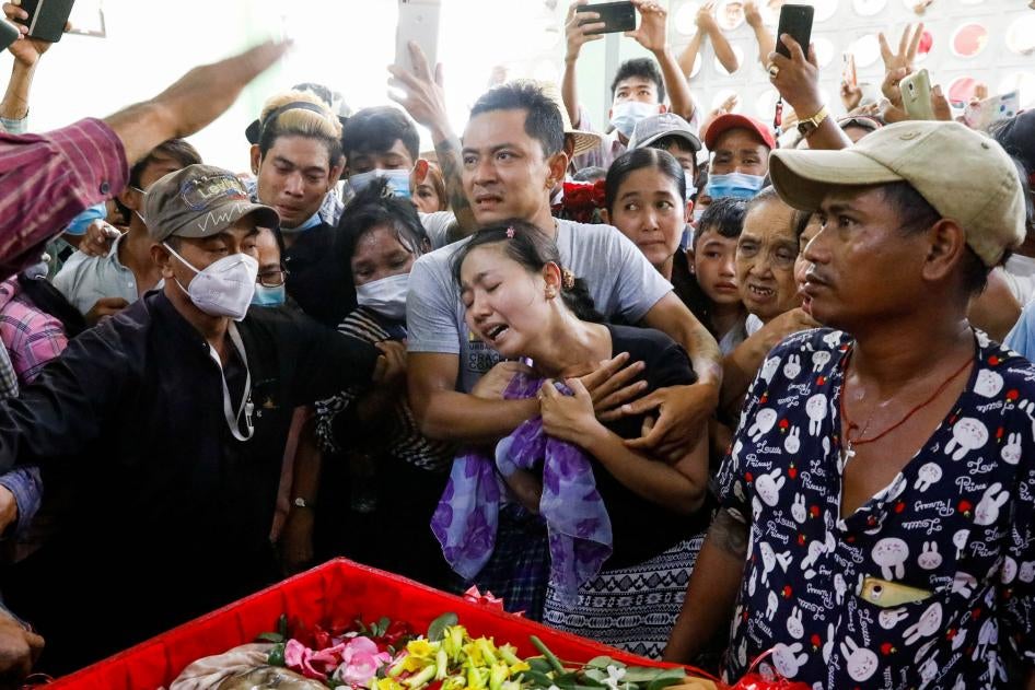 Family members attend the funeral of Zaw Myat Lynn