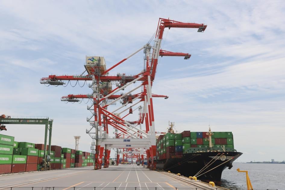 Shipping cranes on a wharf inside the Tokyo Bay.