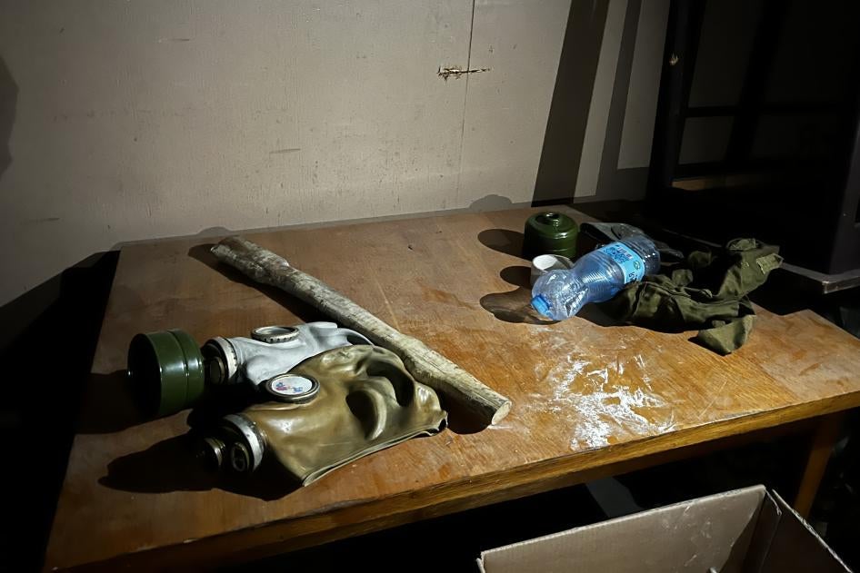 Gas masks left in a room in the basement of Izium Central Police Station, where Russian forces detained and tortured people. Two men held there said their captors forced gas masks over their faces when their screams from the abuse became too loud, September 23, 2022