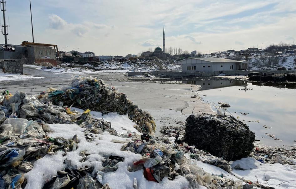 Illegally dumped plastic waste, including imported European plastic waste imports, near a residential neighborhood in Sultangazi, Istanbul, Turkey.