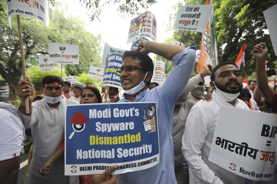Congress party workers shout slogans during a protest accusing Prime Minister Narendra Modi's government of using military-grade spyware to monitor political opponents, journalists and activists in New Delhi, India.