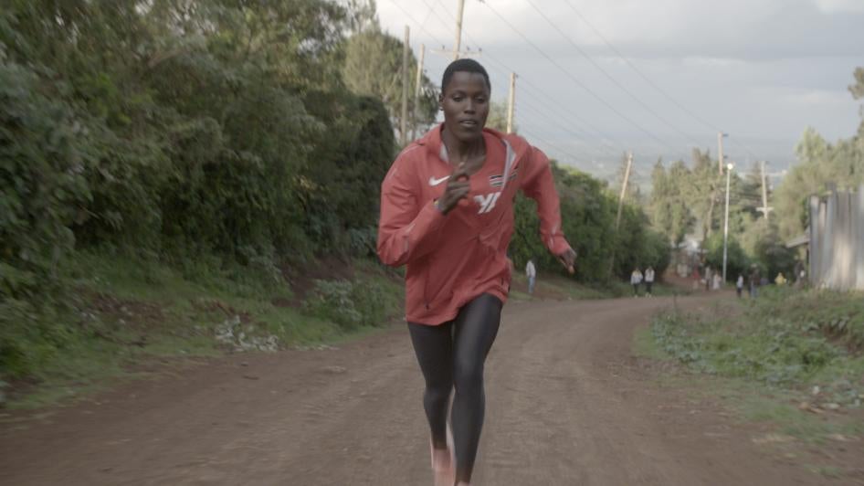 Screenshot from the film Woman of a woman running