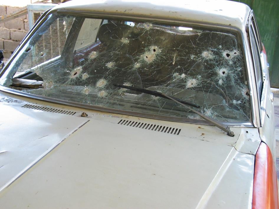 A car shot-up by US soldiers during the protest on April 28, 2003. The US military claimed that gunmen were using the car as cover, but protesters denied that any of them had opened fire.