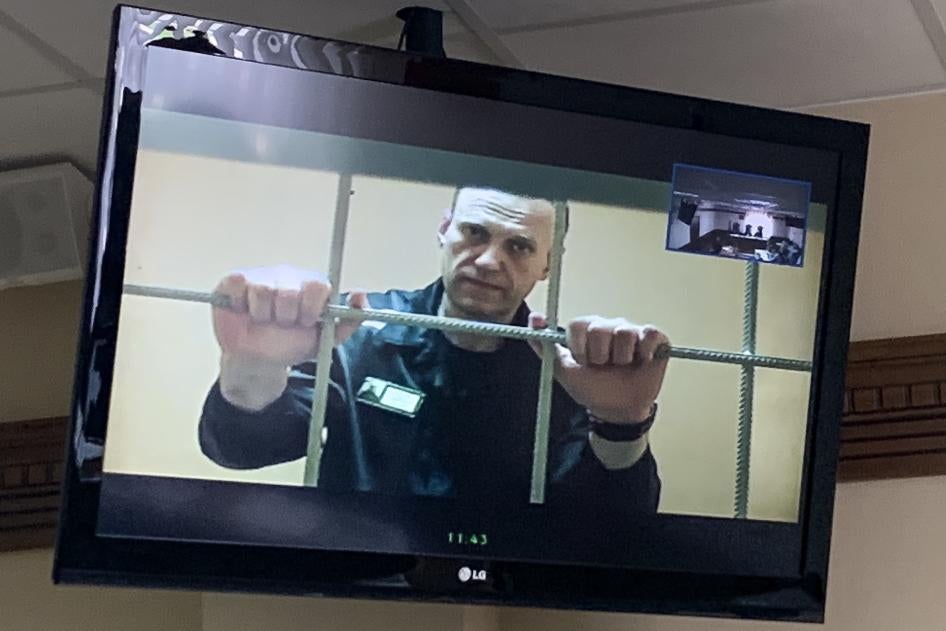 Russian opposition leader Alexei Navalny appears from prison on a video link in a courtroom in Vladimir, Russia. 