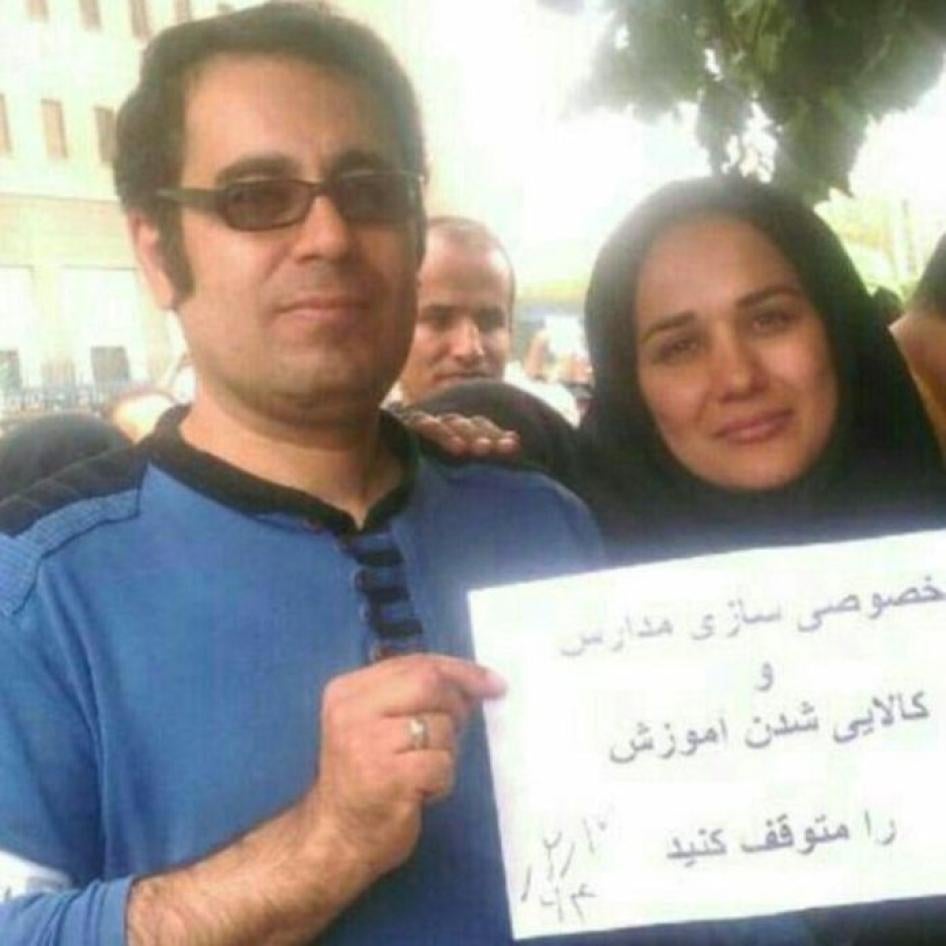 Mohammad Habibi and his wife at a protest against schools' privatization in Iran.