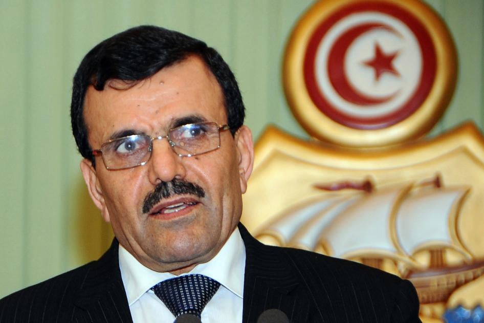 علي العريّض، رئيس الحكومة آنذاك، يلقي كلمة في خلال مؤتمر صحفي في العاصمة تونس، في 22 فبراير/شباط 2013.