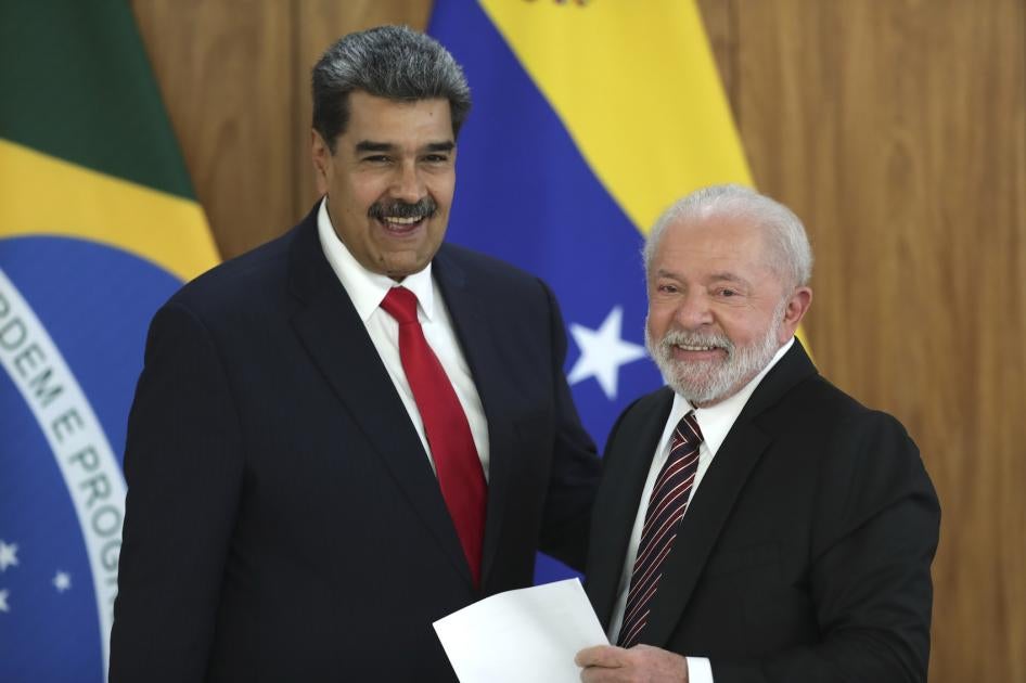 Venezuela's President Nicolas Maduro, left, and Brazilian President Luiz Inacio Lula da Silva smile at a press conference after their bilateral meeting at Planalto palace in Brasilia, Brazil, May 29, 2023. 