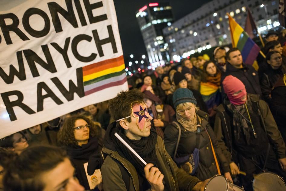 Dozens of LGBTQ activists and citizens protested in Warsaw against the LGBT-free zones resolutions.