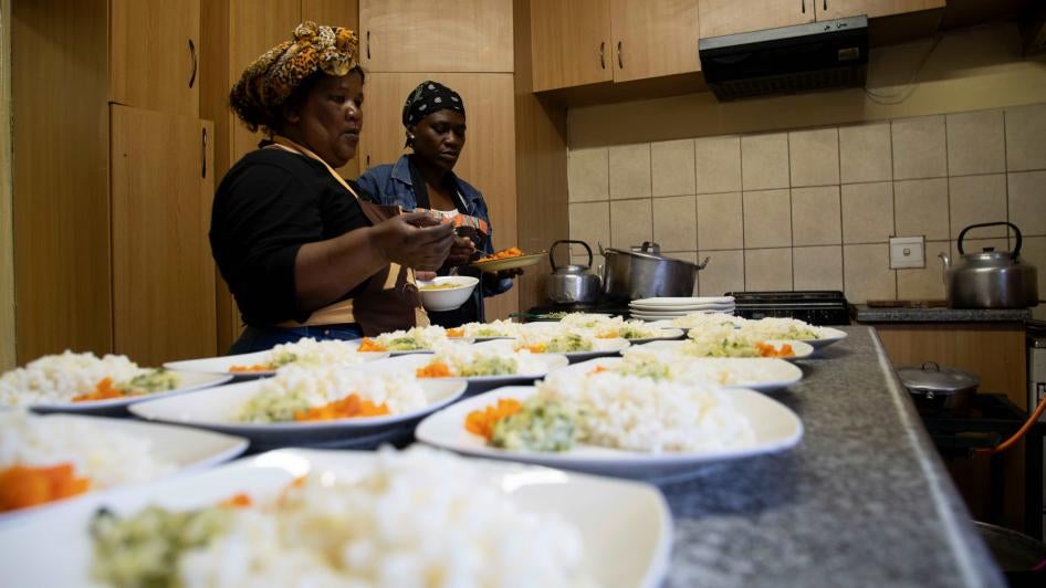 Employees of the Dimbaza Society for the Aged prepare lunch at its service center in Dimbaza, Eastern Cape.